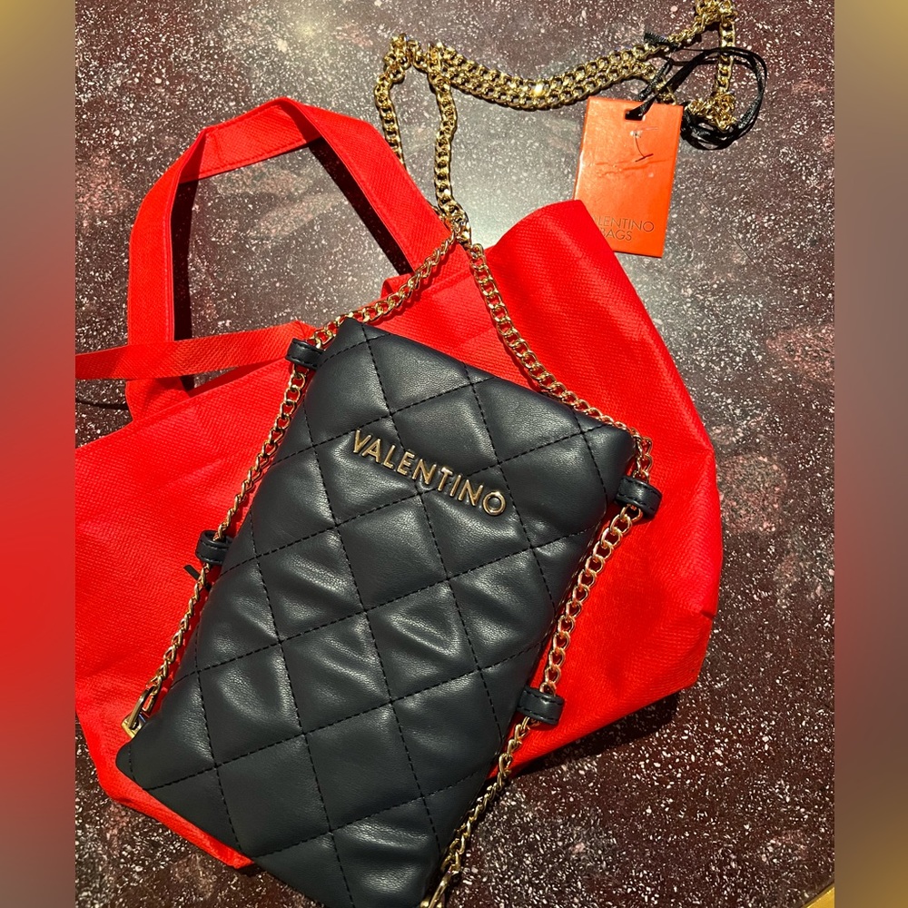 Valentino mini bag, never used, with tags. Navy blue leather.